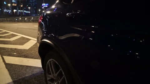 The side of the car that shines from the light of the lanterns. Stock Footage 150106589