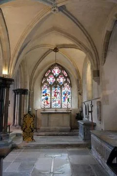 Side Chapel with Vaulted Ceiling and Colorful Gothic Stained Glass.. Stock Photos