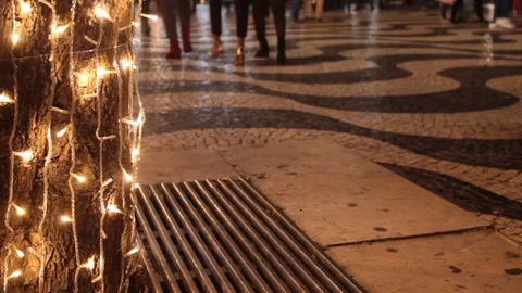 Side of Christmas Tree and a walk in Lisbon night at Christmas time Stock Footage 83613608