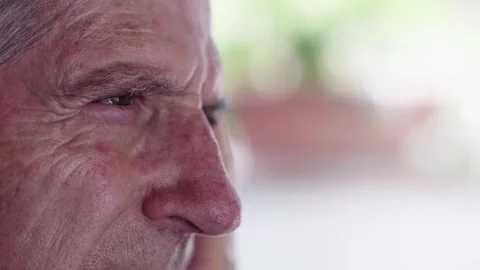 Side close-up of elderly man's face, highlighting age lines Stock Footage 277339507