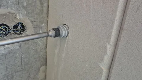 Side close up of long shank core drill boring concrete pylon Vídeo Stock 343413124