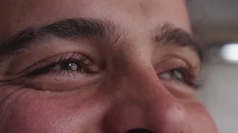 Side close-up of smiling eyes looking up Stock Footage 277193781