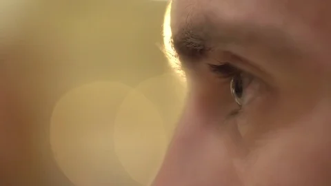 The side close-up view of the light green eye of the man. Stock Footage 82614891