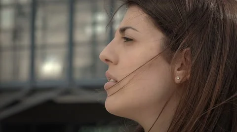 Side closeup portrait of a sad pensive young woman thinking to her problems Stock-Footage 64799333