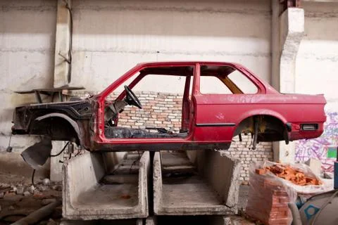 Side of the crashed red car Stock Photos