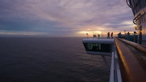 Side of Cruise Ship Passengers Walk to Take Photos Sunset Sailing Ocean Stock Footage 277919662