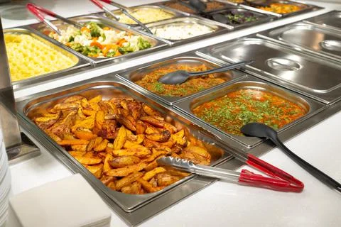 Side dishes on the serving line, self-service restaurant. steamed vegetables Stock-Fotos