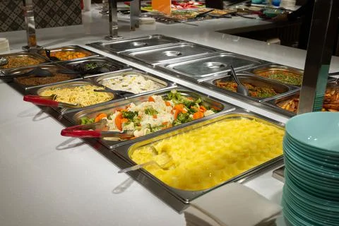 Side dishes on the serving line, self-service restaurant. steamed vegetables Foto stock