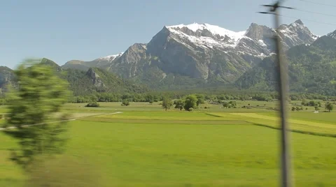 Side Driving Plate with  Alps Stock Footage 67596918