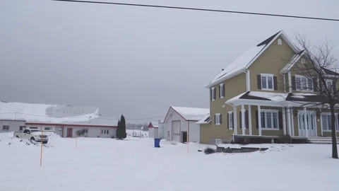 Side Driving Plate Winter Canada Countryside Houses and Land Stock Footage 102610843