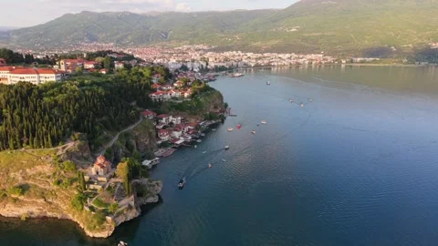 Side Drone Flight Over Ohrid Old Town And Kaneo Church At Sunset Vidéo 338611001