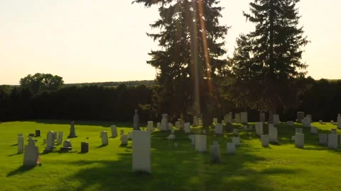 Side drone flight through Gorham Cemetery. An old grave yard that with Stock Footage 236623974