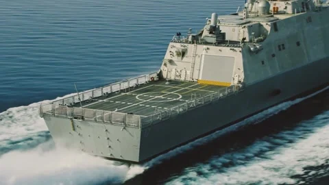 Side drone shot of a cruising navy ship Stock Footage 137101194