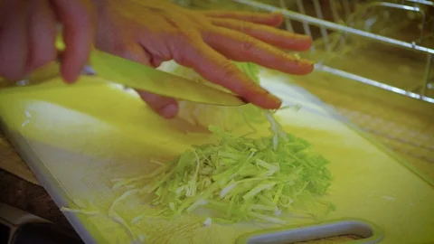 Side frame for cutting cabbage with knife for salad Video stock 129137223