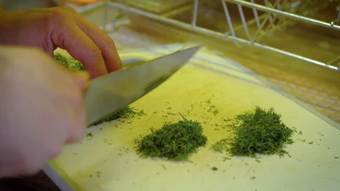Side frame for cutting dill with knife for salad Video stock 129137169