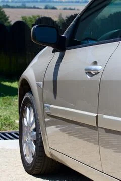 Side front of the car with a mirror and a wheel Stock Photos