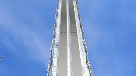 Side of a high modern skyscraper from up to down Stock Footage 105855546