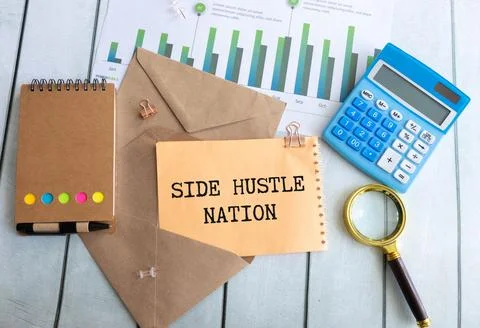 SIDE HUSTLE . Notepad and office supplies on a light background Stock Photos