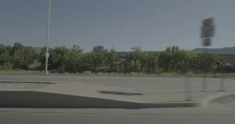Side left driving plate - Highway 160 at Camino Del Rio Durango Stock Footage 288534479