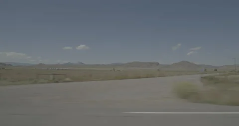 Side left driving plate - Highway 112 at Mile 2 Rio Grande County Vídeos de archivo 288797127