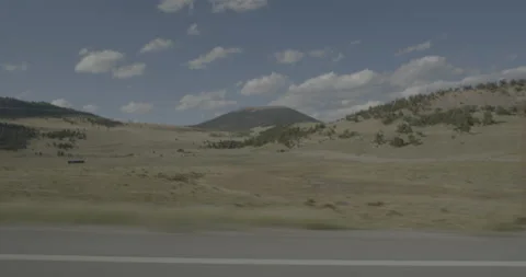 Side left driving plate - Highway 285 at Mile 188 Park County Vídeos de archivo 288988600