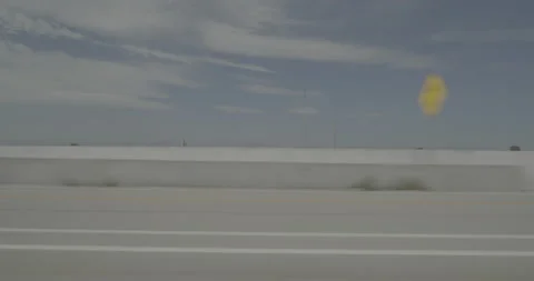 Side left driving plate - Highway 25 at Highway 56 Weld County Stock Footage 289577757