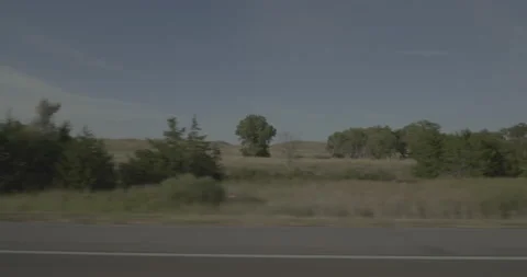 Side left driving plate - Highway 20 at Mile 135 Merriman Stock Footage 290146068
