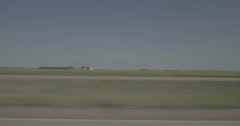 Side left driving plate - Highway 90 at Mile 348 Farmer Stock Footage 290821020