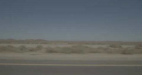 Side left driving plate - Highway 58 at Twenty Mule Team Road, Rich Vídeo Stock 293720769