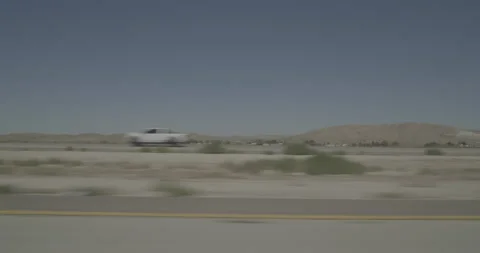 Side left driving plate - Highway 58 at Mile 30, Barstow Stock Footage 293782402