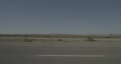 Side left driving plate - Highway 15 at Mile 160, Yucca Grove Vídeo Stock 293919623