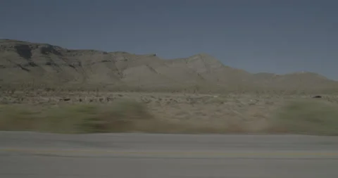 Side left driving plate - Highway 15 at Mile 168, Mountain Pass Stock Footage 293925162
