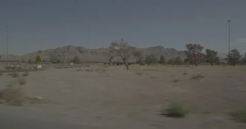 Side left driving plate - Highway 15 at Mile 14, Jean Stock Footage 294547946