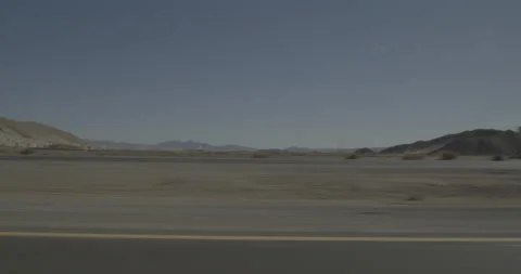 Side left driving plate - Highway 15 at Mile 121, Cronese Valley Vídeos de archivo 294592886