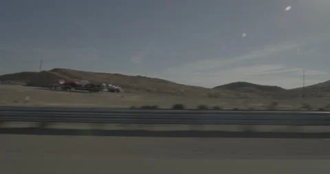 Side left driving plate - Highway 15 at Mile 80, Barstow Stock Footage 294692890