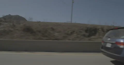 Side left driving plate - Highway 1 at Paseo de Caballo, San Luis Obispo Stock-Footage 294791553