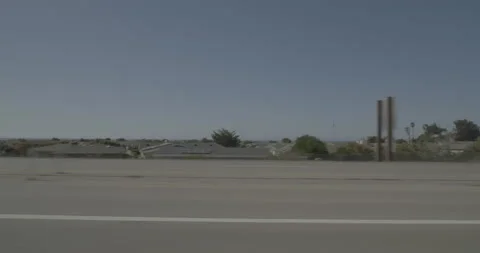 Side left driving plate - Highway 1 at Elena Street, Morro Bay Stock Footage 294797799