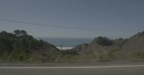 Side left driving plate - Highway 1 at Mile 71, Ragged Point Stock Footage 294927183