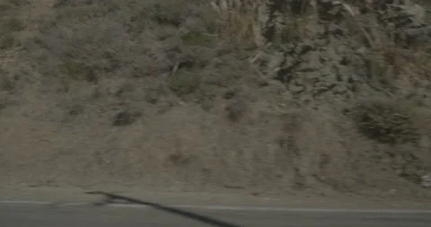 Side left driving plate - Highway 1 at Mile 73, Ragged Point Stock Footage 294932328