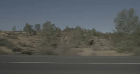 Side left driving plate - Highway 120 at Mile 10, Yosemite Junction Stock Footage 295044133