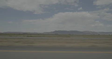 Side left driving plate - I-15 at Mile 80 Parowan Stock Footage 288449599