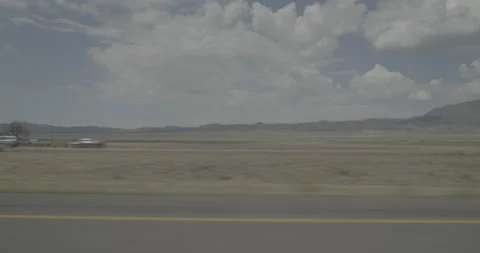 Side left driving plate - I-15 at Mile 89 Parowan Stock Footage 288459904