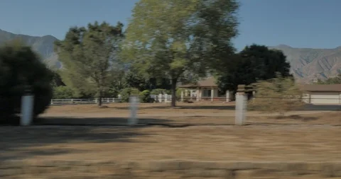 Side left driving plate - Ojai Ave at Gorham Rd, Ojai Stock Footage 102020009
