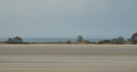 Side left driving plate - PCH at Crystal Cove State Park, Newport Beach Stock Footage 101982105