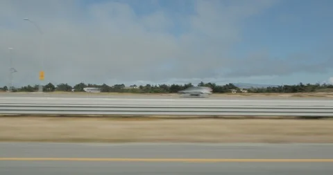 Side left driving plate - PCH at Del Monte Boulevard, Marina Stock Footage 113847092