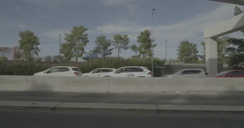 Side left driving plate - Sands Avenue at Manhattan Street, Las Vegas Stock Footage 294195013