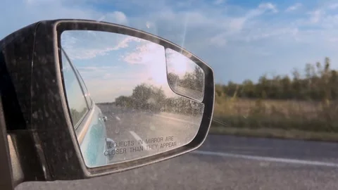 Side mirror of a car close-up. Car mirror with reflection of the road close-up Stock Footage 309006399