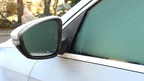 The side mirror of the car was covered with hoarfrost and hoarfrost Stock Footage 123229955