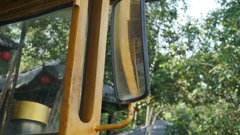 Side Mirror on Modified Visitor Transportation Vehicle Stock Photos