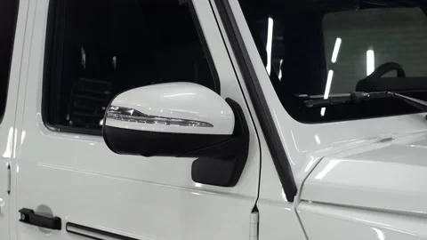 The side mirror of the new pre-most-expensive SUV is white. Close-up car. Stock Footage 135717312